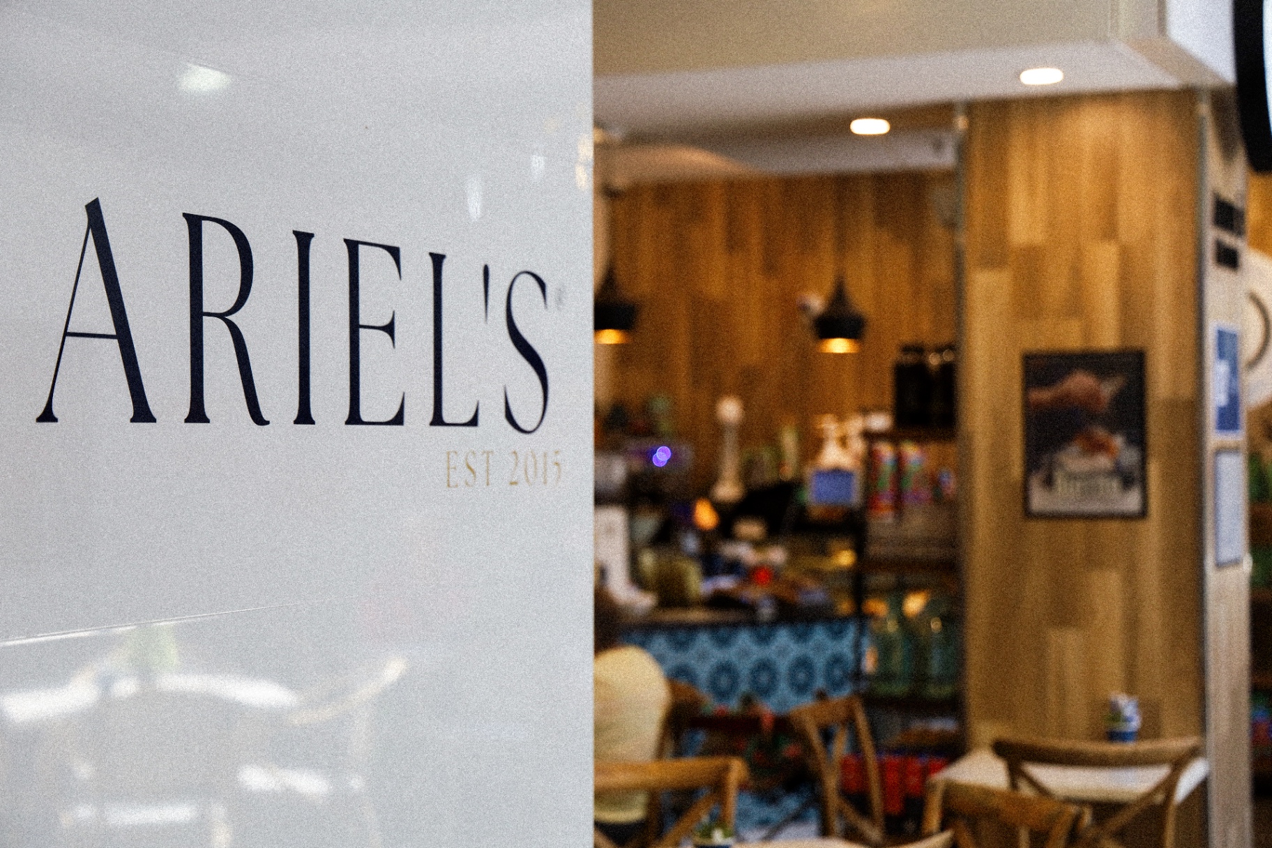 Ariel's storefront with signature logo