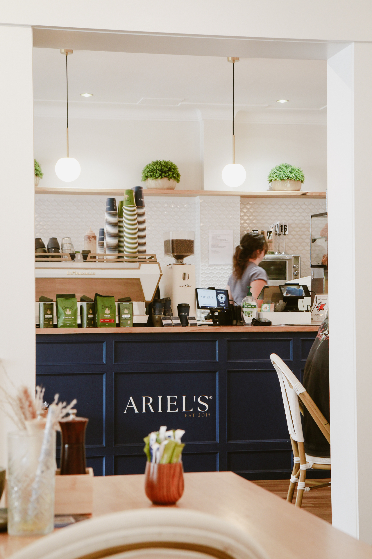 Wide shot of Ariel's Balgownie counter and display